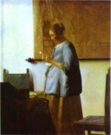 Woman in blue Reading a letter